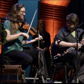 Come Guess Me This Riddle: What Beats Pipes and Fiddle?