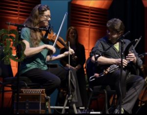 Come Guess Me This Riddle: What Beats Pipes and Fiddle?